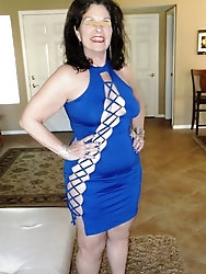 Curvy mature housewife is taking off her dress