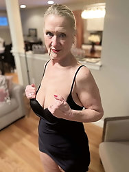 Mature prostitute gets naked